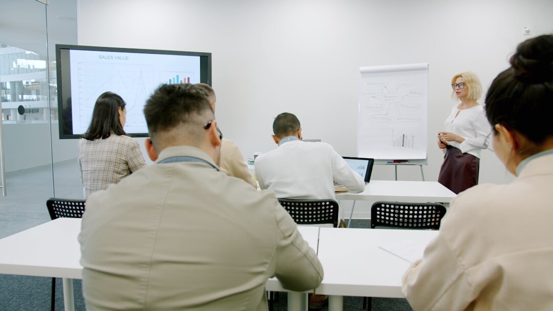 Professionals collaborating in training workshop